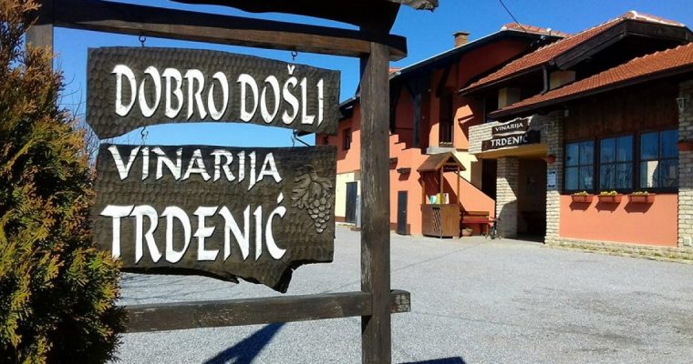 a sign in front of a building